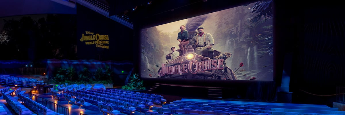 Large theater with the Jungle Cruise movie on the projector screen for the movies premier