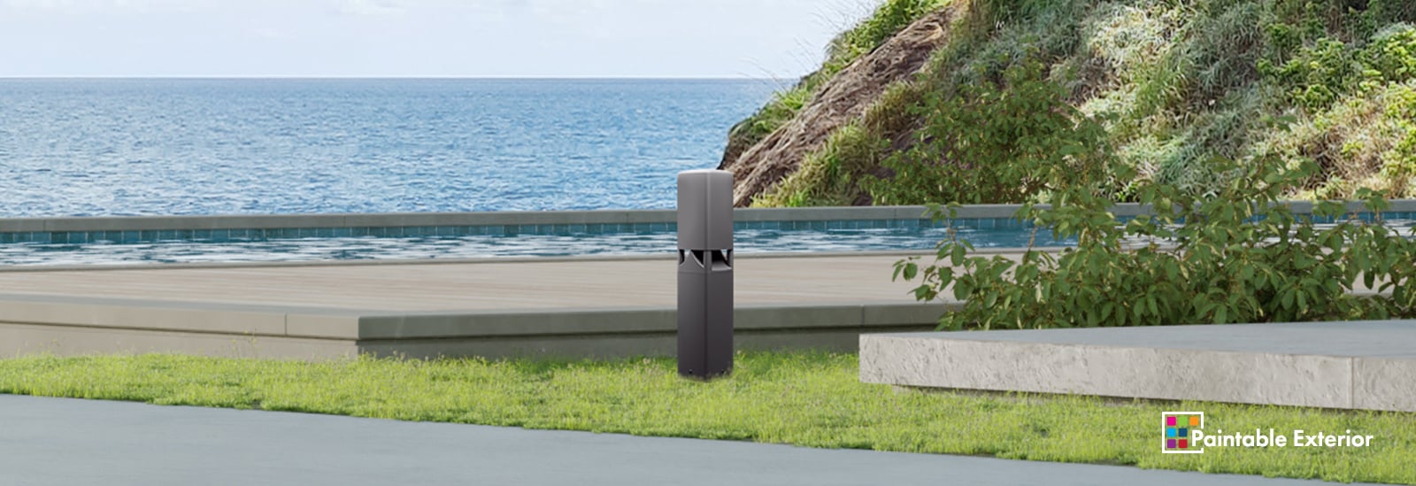 晴れた日に海岸で屋外にあるAD-DWLスピーカーのデジタルレンダリング